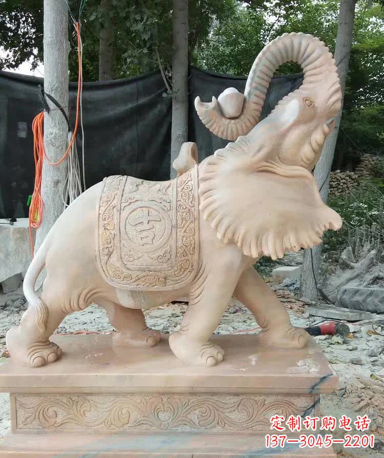 浙江晚霞红卷元宝大象雕塑